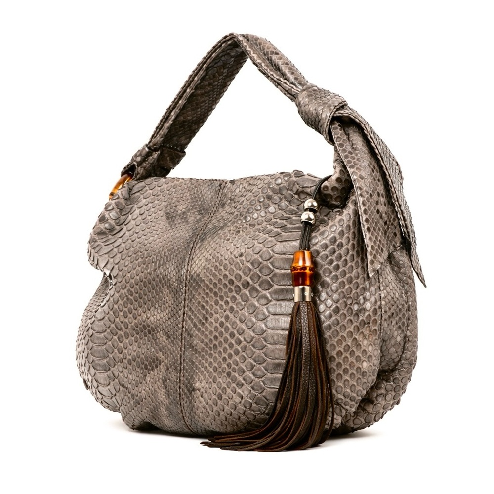 Gucci python bamboo tassel leather shoulder bag. In very good preloved condition